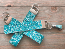 Load image into Gallery viewer, Blue/Teal Floral Stamped/Textured Wristlets
