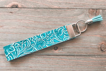 Load image into Gallery viewer, Blue/Teal Floral Stamped/Textured Wristlets
