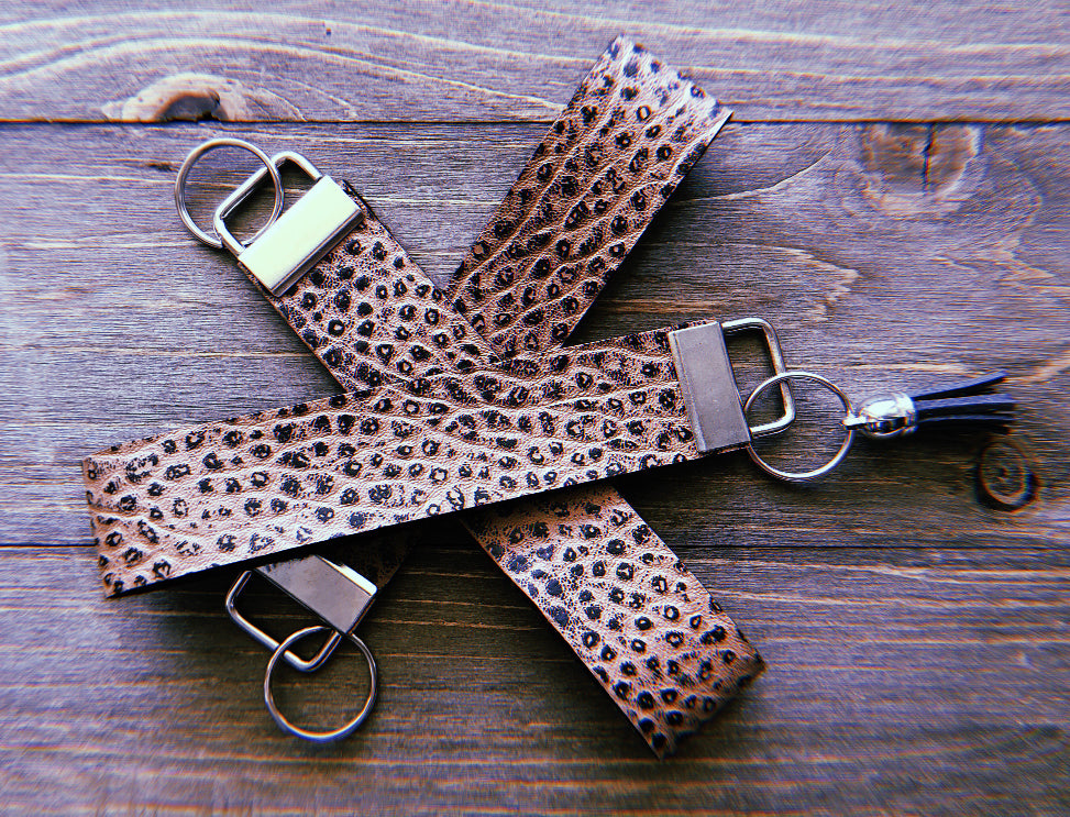 Dark Tan With Grey Dotted Detailing Textured Wristlets