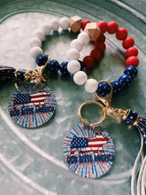 Load image into Gallery viewer, American Flag Pig Beaded Wristlet
