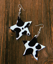 Load image into Gallery viewer, Black &amp; White Cow Print Star Dangle Earrings
