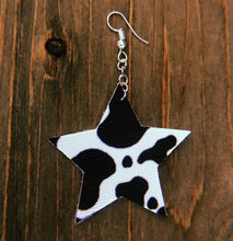Load image into Gallery viewer, Black &amp; White Cow Print Star Dangle Earrings
